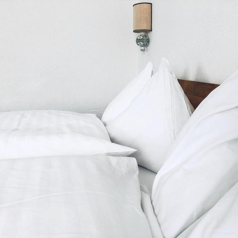 Postel nebo postele na pokoji v ubytování Hotel Regina Terme