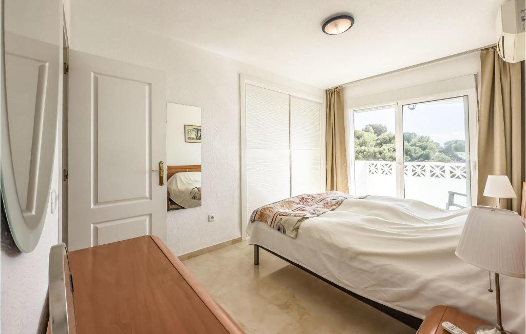 Posteľ alebo postele v izbe v ubytovaní Stunning Apartment In Benalmádena