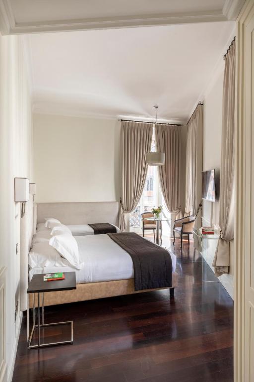 Deluxe Triple Room with Balcony - Annex — room photograph