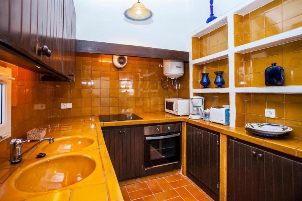 Kuchyň nebo kuchyňský kout v ubytování Villa Bini Sek
