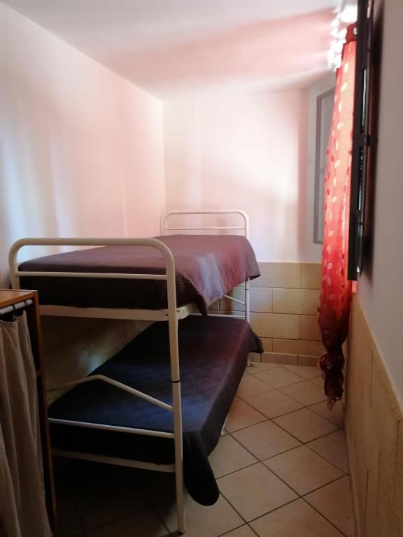 Postel nebo postele na pokoji v ubytování Appartamenti Frassanito