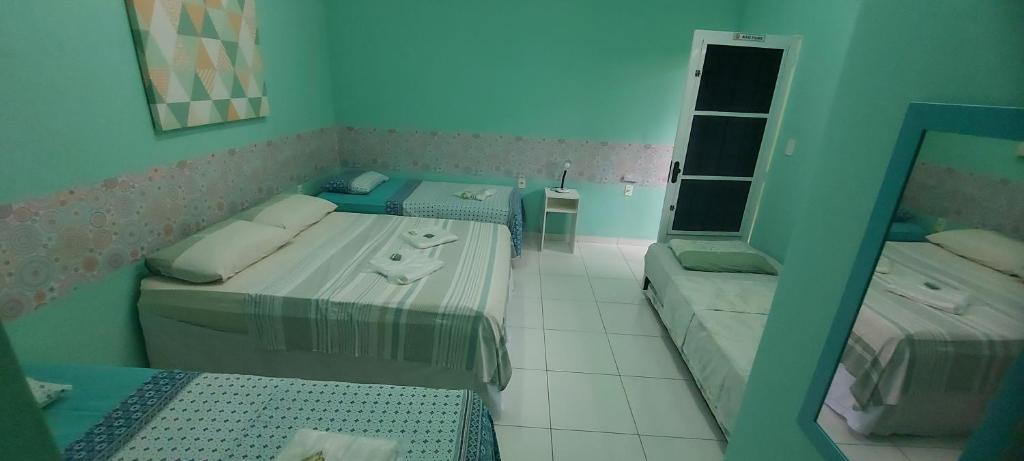 Postel nebo postele na pokoji v ubytování Hotel Colors Manaus