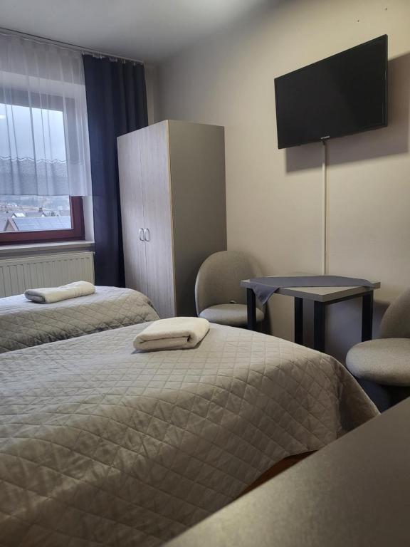 Postel nebo postele na pokoji v ubytování Gościniec Pieniński