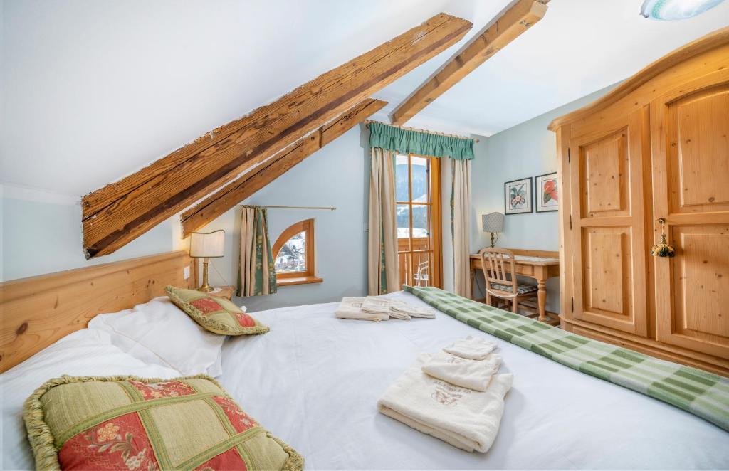 A bed or beds in a room at Casa il Tiglio
