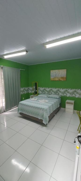 Postel nebo postele na pokoji v ubytování Hotel Colors Manaus