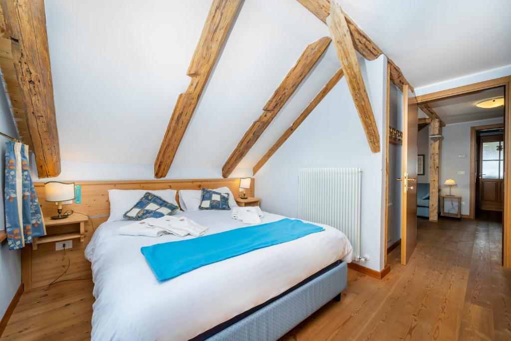 A bed or beds in a room at Casa il Tiglio