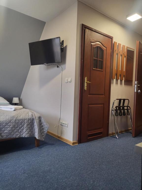 Postel nebo postele na pokoji v ubytování Gościniec Pieniński