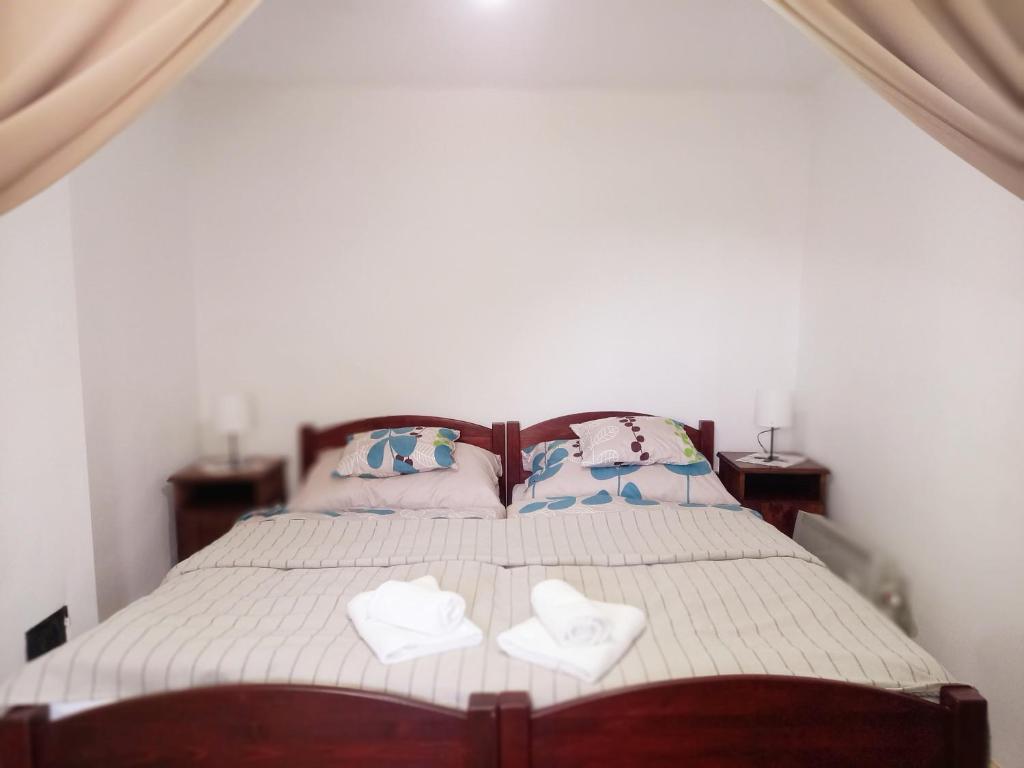 Postel nebo postele na pokoji v ubytování Idill Cottage Vendégház