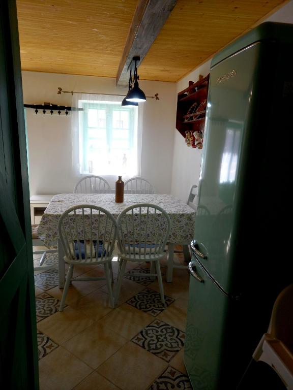 Posezení v ubytování Idill Cottage Vendégház