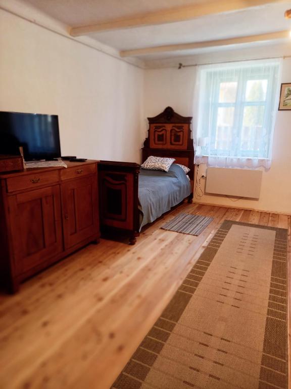 Postel nebo postele na pokoji v ubytování Idill Cottage Vendégház