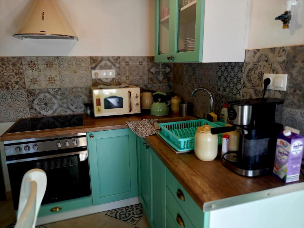 Kuchyň nebo kuchyňský kout v ubytování Idill Cottage Vendégház
