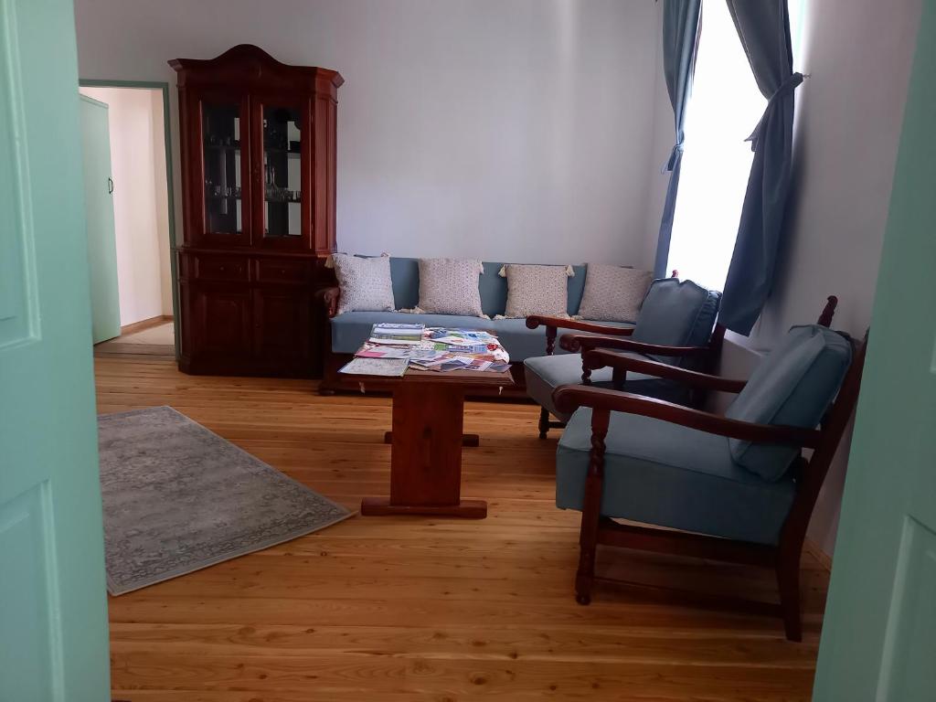 Posezení v ubytování Idill Cottage Vendégház
