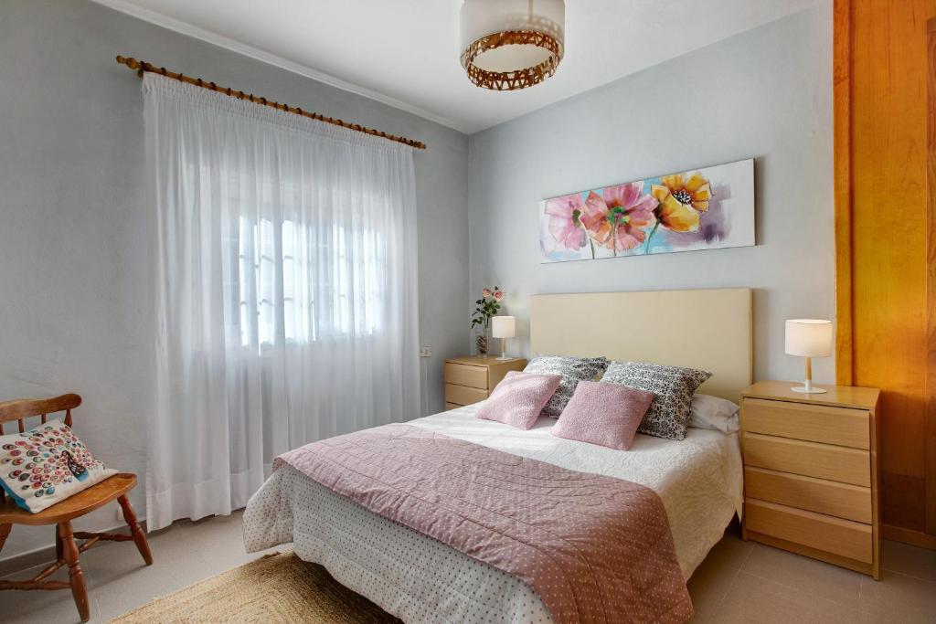 Postel nebo postele na pokoji v ubytování Casa Paseo Mirabal
