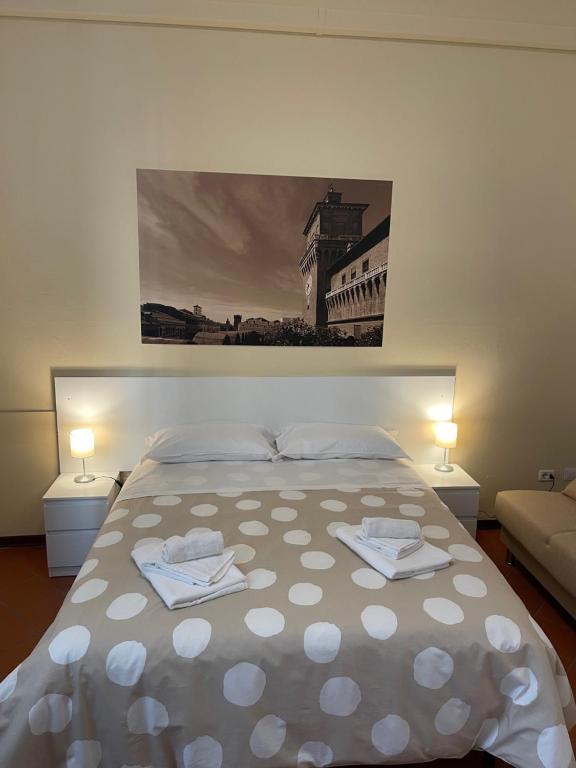 Postel nebo postele na pokoji v ubytování Downtown - Camere in Centro