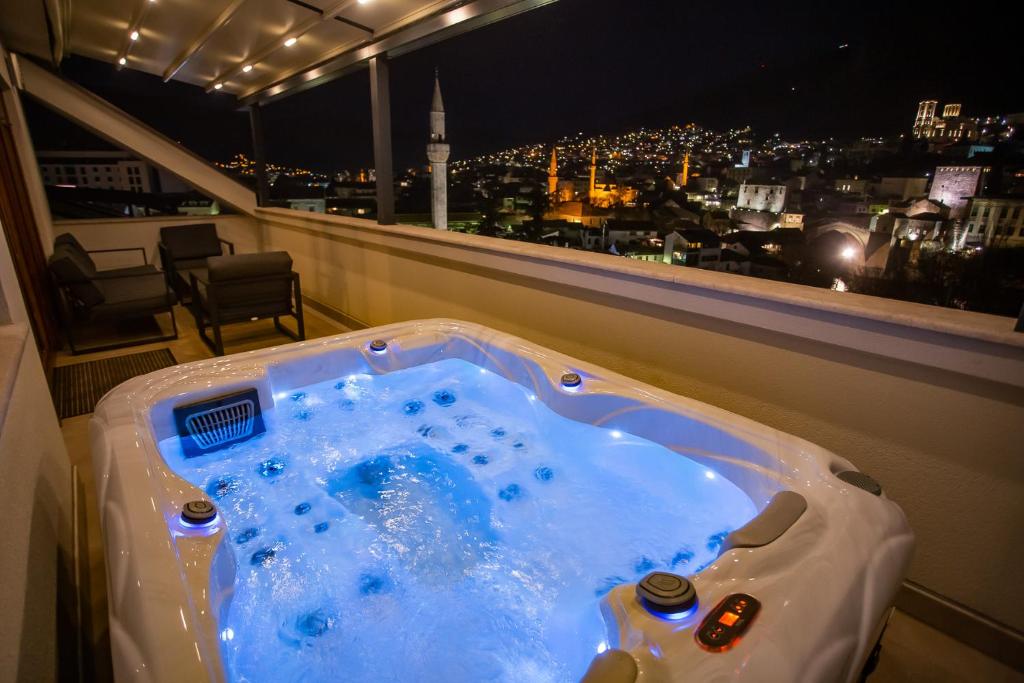 Image showcasing Sky Penthouse Old Bridge with sauna and jacuzzi - SuiteTrails