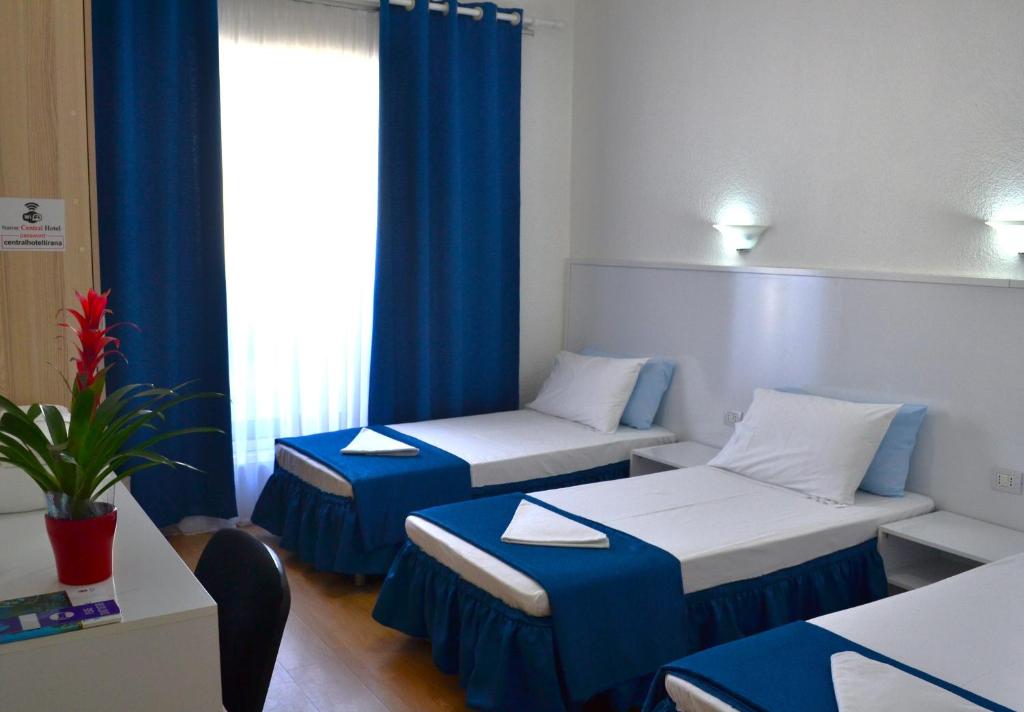 Letto o letti in una camera di Tirana Central GuestHouse