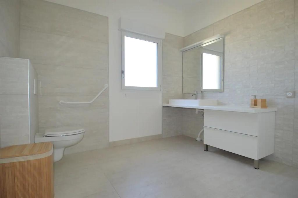 Kúpeľňa v ubytovaní Saint Côme Beach House