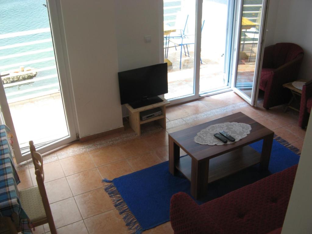 Uma televisão e/ou sistema de entretenimento em Apartment's Belvedere