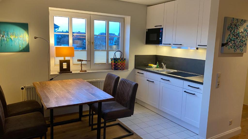 Kuchyň nebo kuchyňský kout v ubytování Hotel Kiose