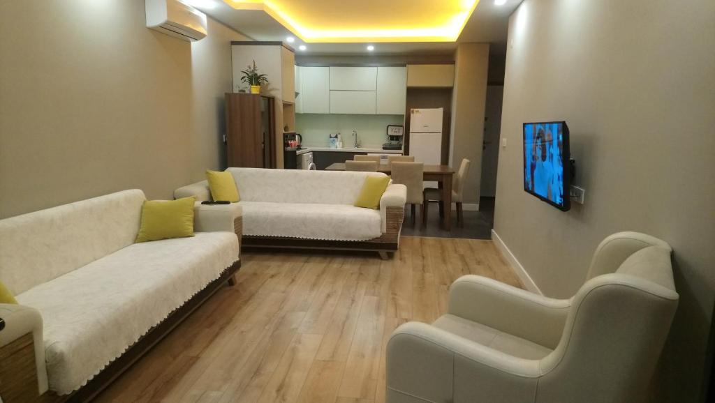 TV a/nebo společenská místnost v ubytování Mali Garden Residence