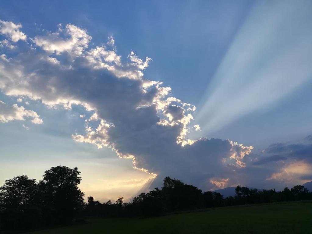 The sunrise or sunset as seen from a vendégházakat or nearby