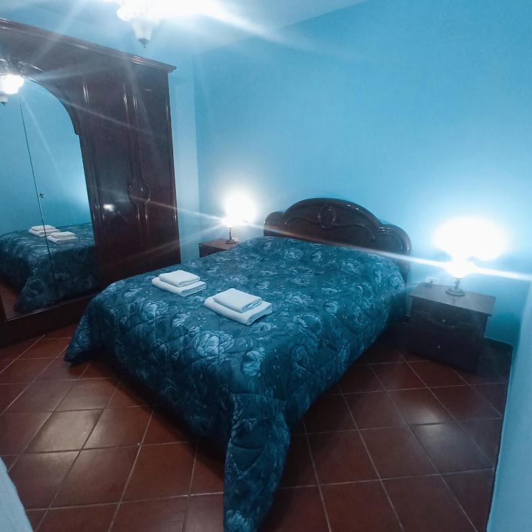 Łóżko lub łóżka w pokoju w obiekcie Villa Il Leccio - Trulli