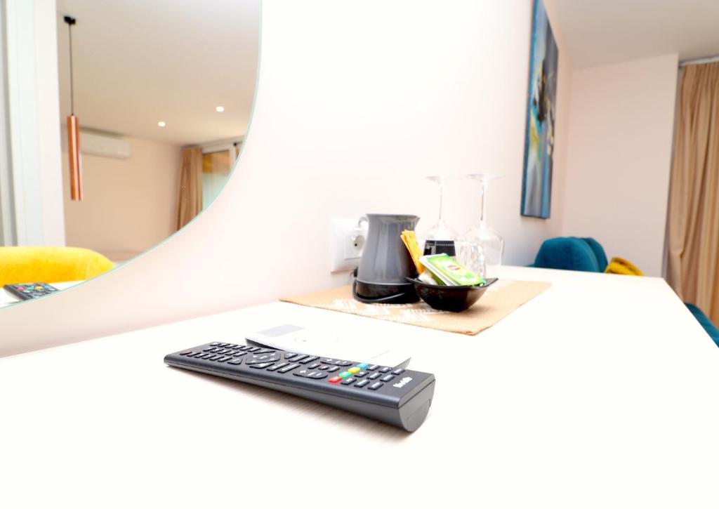TV a/nebo společenská místnost v ubytování Fegi Rooms