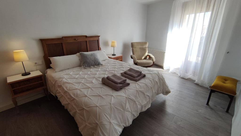 Postel nebo postele na pokoji v ubytování Apartaments rurals CAL PARRO, Batea (Terra Alta)