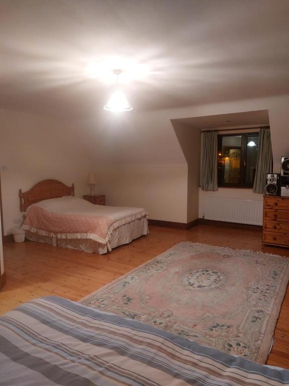 Postel nebo postele na pokoji v ubytování Bree House Malin Head