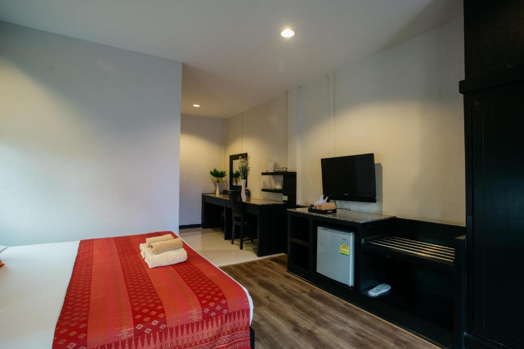 TV a/nebo společenská místnost v ubytování Diamond Park Inn Chiangrai & Resort