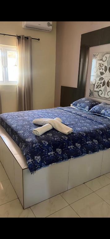 Postel nebo postele na pokoji v ubytování Curasita Colour Appartments & Resort - adres kaya Sucre nst 282