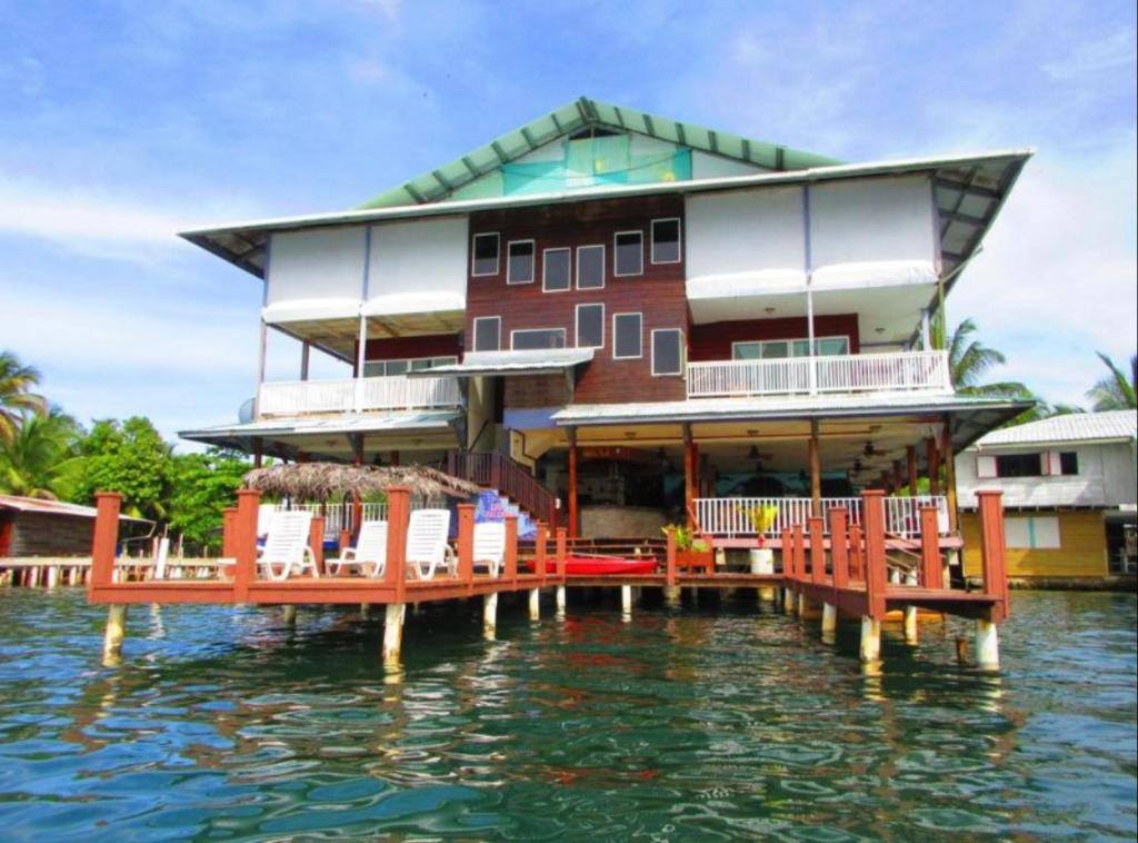 a house on a dock on the water at Los Balcones Over The Sea in Bocas del Toro