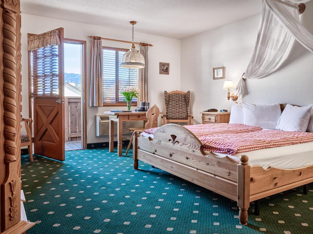 Postel nebo postele na pokoji v ubytování Hotel Pension Anna
