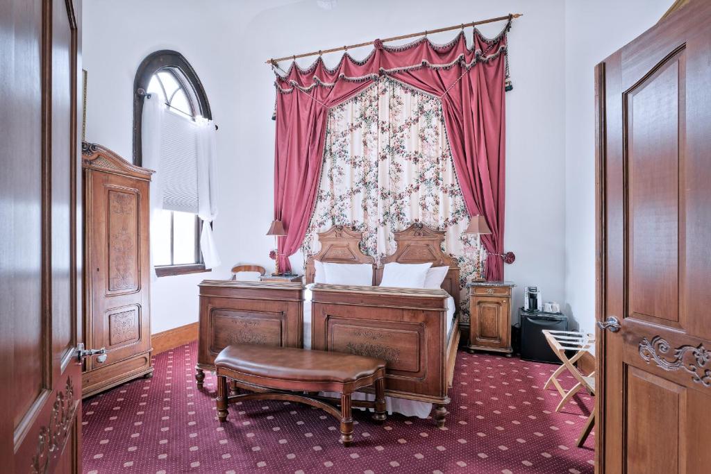 Postel nebo postele na pokoji v ubytování Hotel Pension Anna