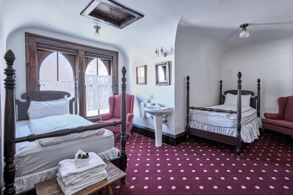 Postel nebo postele na pokoji v ubytování Hotel Pension Anna