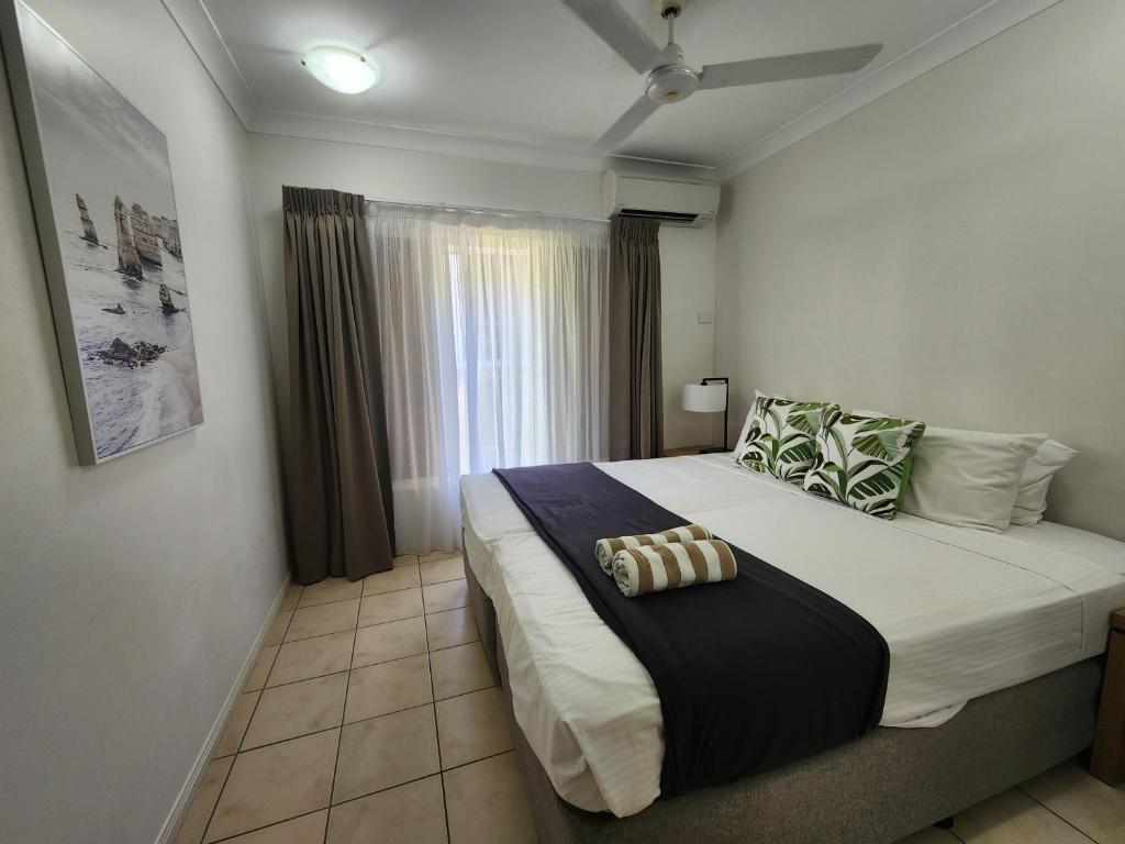 Postel nebo postele na pokoji v ubytování Central Plaza Port Douglas