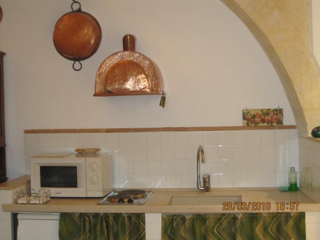Una cocina o cocineta en Sax Barisano