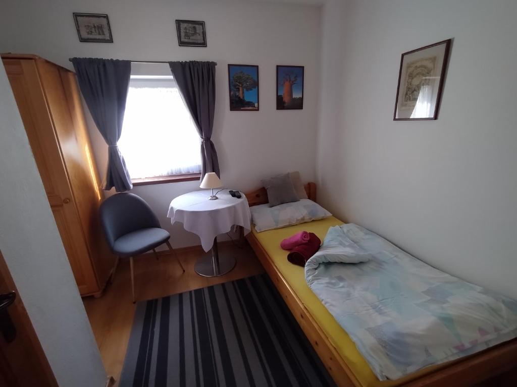 Postel nebo postele na pokoji v ubytování Penzión Evka