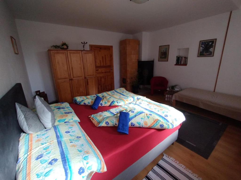 Postel nebo postele na pokoji v ubytování Penzión Evka
