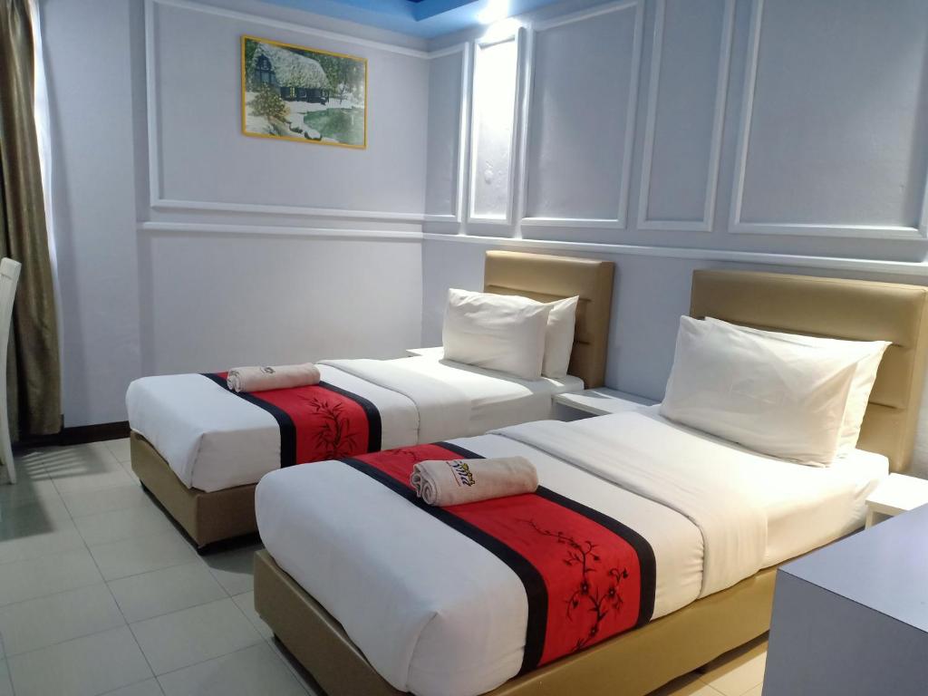 Postel nebo postele na pokoji v ubytování Motel Fyna