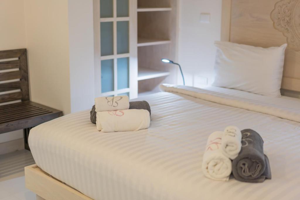 Postel nebo postele na pokoji v ubytování Hill Side Karon Kata Beach Condo