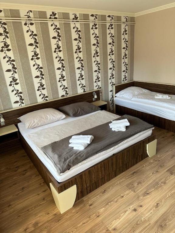 Posteľ alebo postele v izbe v ubytovaní Home Sweet Apartment XL