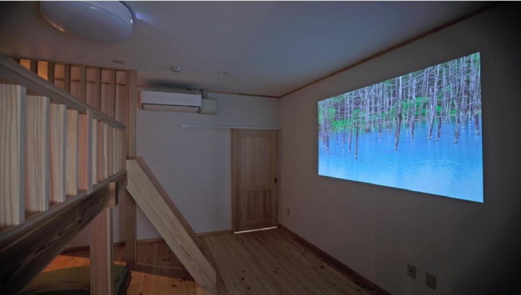 TV a/nebo společenská místnost v ubytování Onsen Petit Hotel Yukori Bandai Atami
