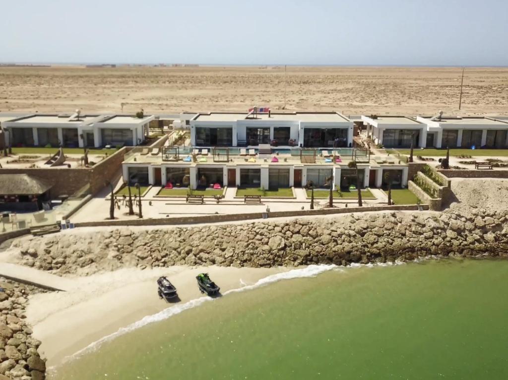an aerial view of a resort on the beach at Bavaro Beach Dakhla in Dakhla