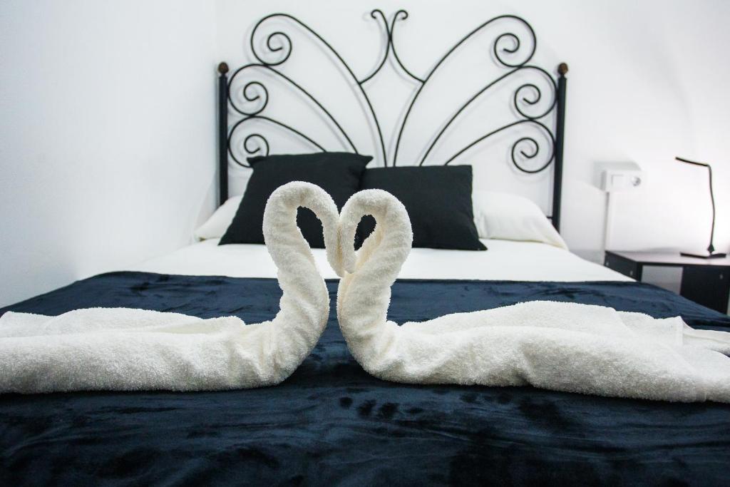 A bed or beds in a room at A Casiña de Juan