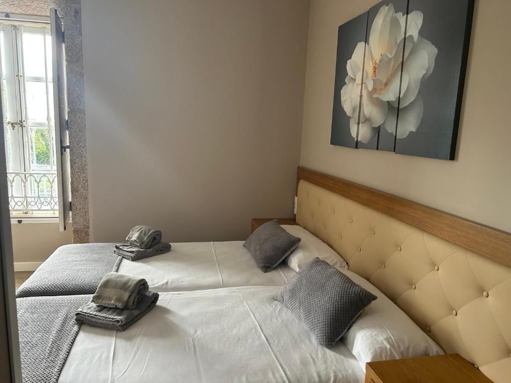 Postel nebo postele na pokoji v ubytování Pazo Pias P