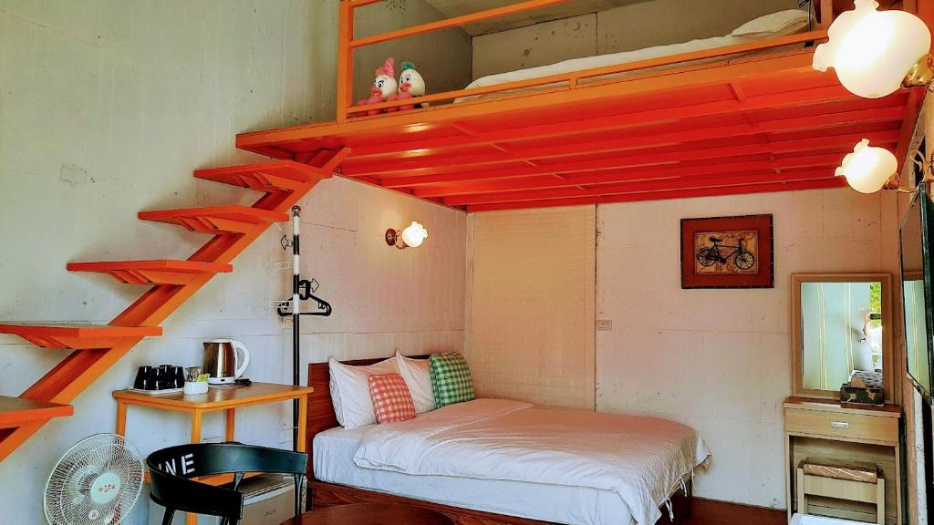 Postel nebo postele na pokoji v ubytování Kelly Field Homestay