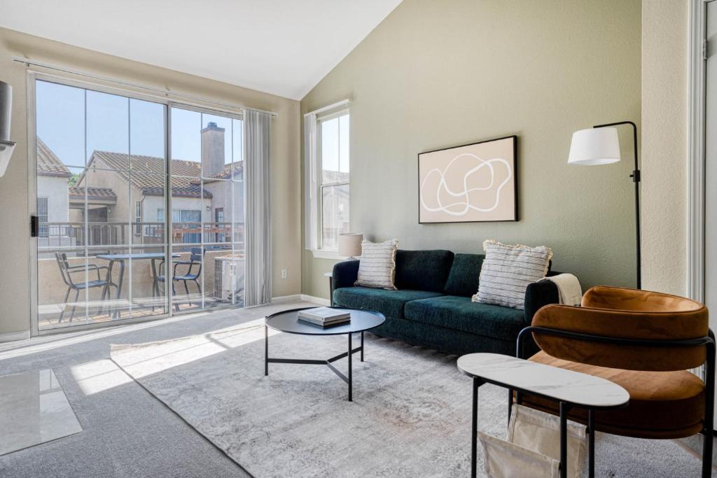 a living room with a couch and a table at San Jose - The Alameda 2br w gym pool SFO-1153 in San Jose