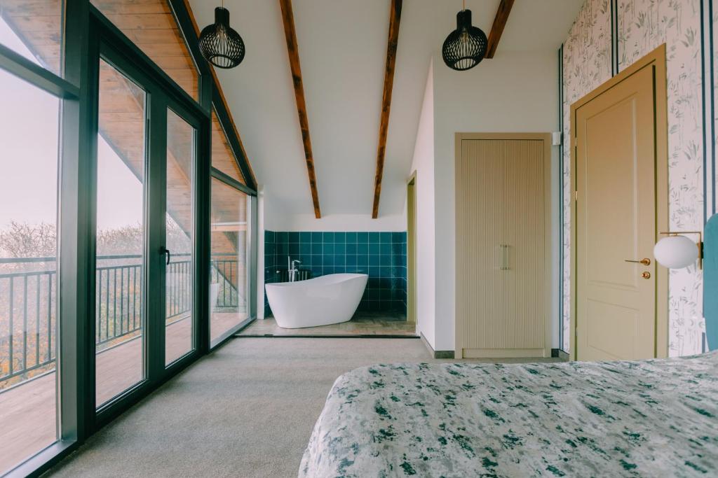 Postel nebo postele na pokoji v ubytování CROFT Villa