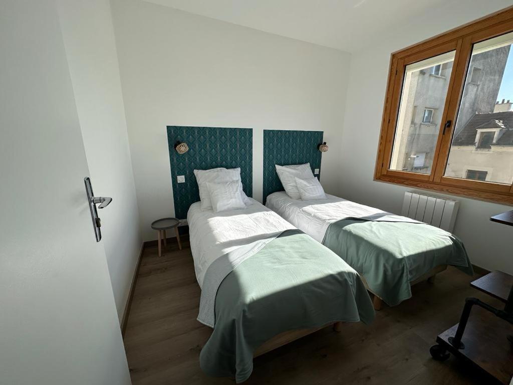 Posteľ alebo postele v izbe v ubytovaní La Galonière Noire, appartement vue mer
